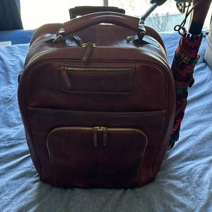 Dooney & Bourke rolling carryon-sample non production piece.